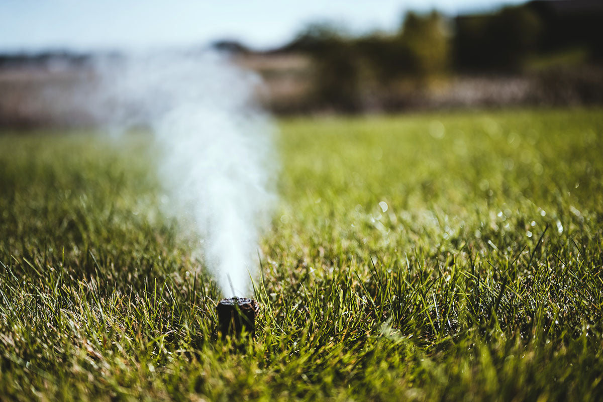 Winterizing an irrigation sprinkler system by blowing pressurized air through to clear out water